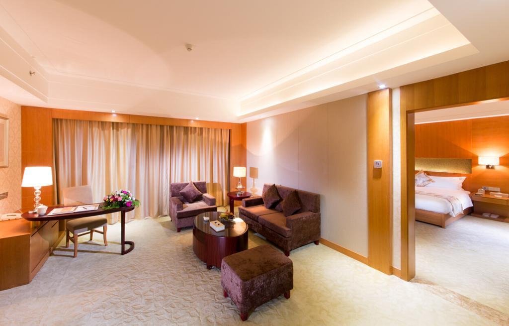 The Grand Plaza Hotel Csian Szoba fotó