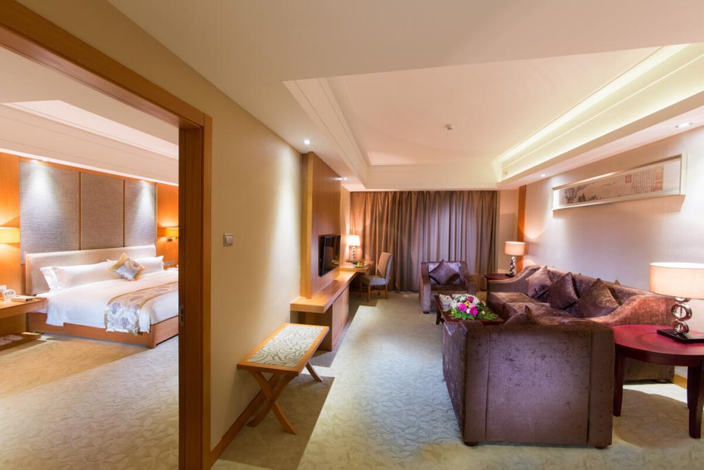 The Grand Plaza Hotel Csian Szoba fotó